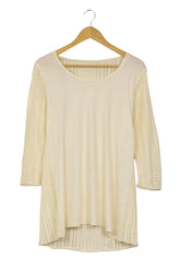 Chompa crema calada con delantero tipo polo