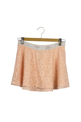 Falda de encaje rosa forrada