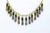 Collar corto dorado con piedras