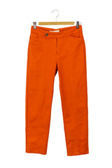 Pantalón Moixx anaranjado de vestir tiro alto recto.