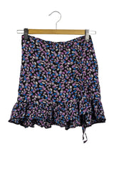 Miniflda Malé negra tela fresca hojas estampaas en tonos lilas y azules