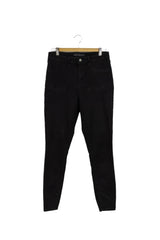 Jean Wild Fable negro skinny, tiro alto, bolsillos delanteros de decoración.