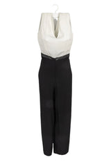 Enterizo Mango, parte de arriba a modo de blusa bvd blanca manga cero cuello V y pantalón negro suelto