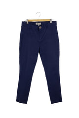 Pantalón Brigitte Naux azul marino, botón dorado en frente y bolsillos de decoración