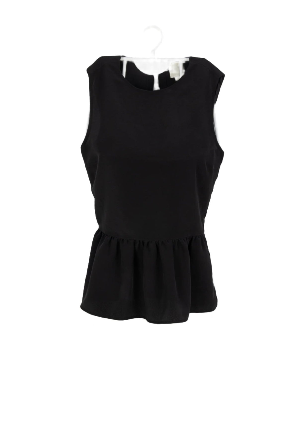 Blusa negra con vuelo en la cintura